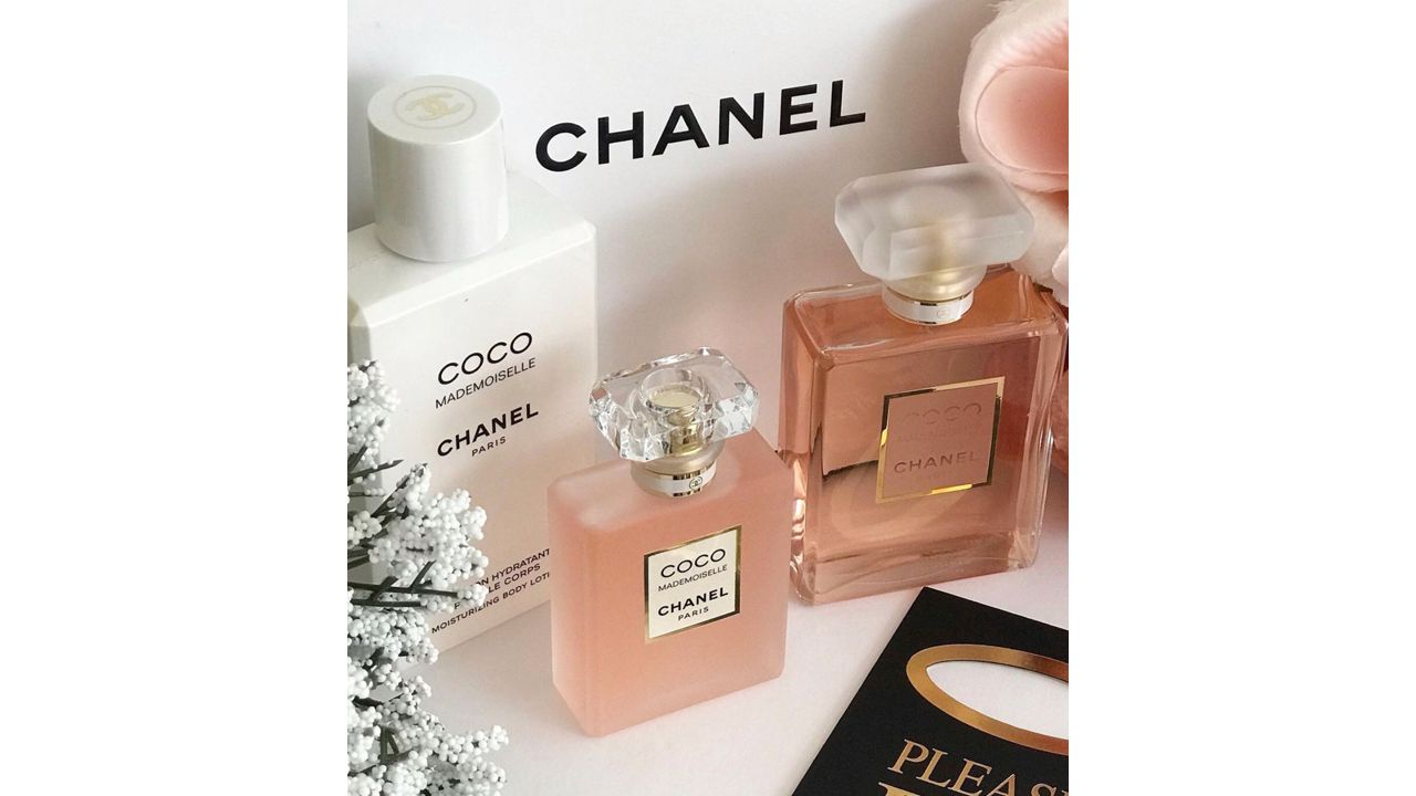 A RUNWAY CLEAR LUCITE PERFUME BOTTLE WITH GOLD HARDWARE, CHANEL, 2014