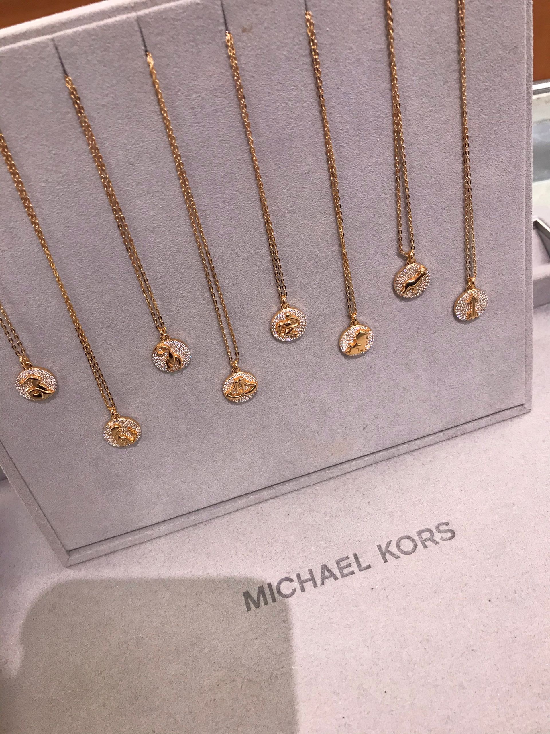 Michael Kors Zodiac symbol necklaces 